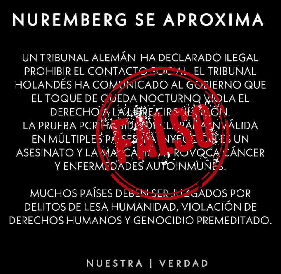 Foto del cartel que amenaza con crímenes de lesa humanida y genocidio por medidas contra la pandemia